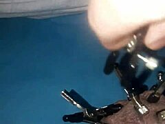 Teasing cock with clamps all over