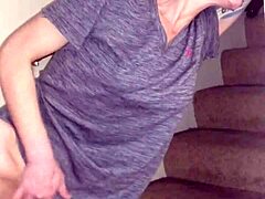 Redhead wife strips in solo scene