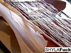 Shyla Stylez in erotic solo scene with finger banging