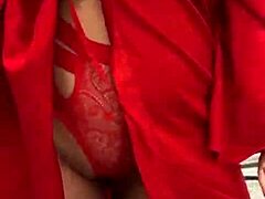 Steamy brunette tease in red