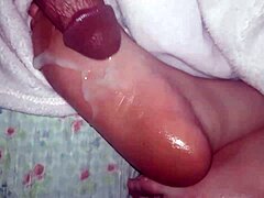 Massive Cumshot on Slick Oiled Feet