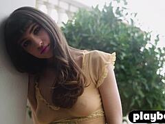 Petite brunette Ivy Rose flaunts curvy booty in daring strip.