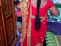 This desi housewife beauty changes her sari at home. Her charm just fills the room with allure!