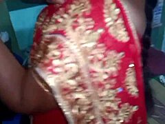 This desi housewife beauty changes her sari at home. Her charm just fills the room with allure!