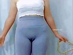 Hey, watch this Asian girl groove with a sexy cameltoe on display.
