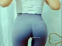 Hey, watch this Asian girl groove with a sexy cameltoe on display.