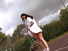 tennis girl claudia rossi goin solo with her toy... oops i meant playing!