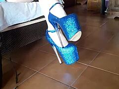 Latina milf struts in ankle boots and striking blue high heels