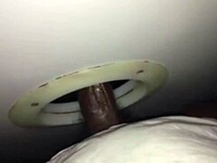 Blonde milf sucks stranger’s big cock through glory hole, disappointing skills.