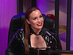 The redhead milf dominates as BDSM queen with latex and lesbian teasing action. She rules the party!