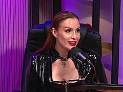 The redhead milf dominates as BDSM queen with latex and lesbian teasing action. She rules the party!