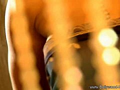 This Indian dance teases with every move she makes. Her striptease builds raw desire in the room.