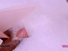 super cute teen slips into a steamy bath