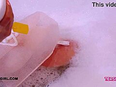 super cute teen slips into a steamy bath