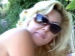 sexy blonde milf teases with a massive shaft