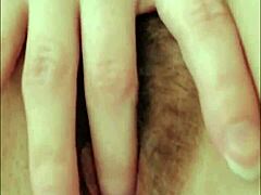 Young Russian student in stockings fingers pussy and anus. Black belt adds spice.