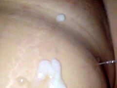 Big pregnant belly covered in cum load