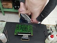 I shoot a huge cumshot on a clientโs machine instead of repairing it.