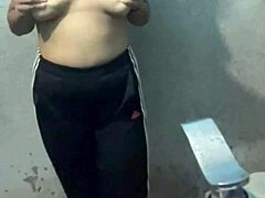 Student sneaks into hotel bathroom for wild action. What’s she doing with those oiled legs?