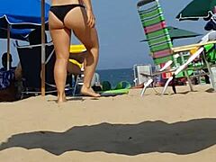 candid shots of this sneaky slut in bikini at beach