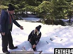 While skiing, Lucette twists her ankle. Her boyfriend calls stepdad for a hot fireplace sex rescue.