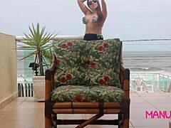 Manu fox caught masturbating at home facing the beach in wild frenzy!