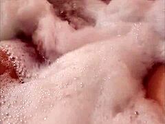 Venezuelan Woman Enjoys Relaxing Time In The Jacuzzi With Bubbles And Warm Water