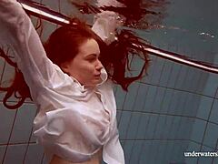 big natural tits babe lola enjoys underwater swimming in the pool