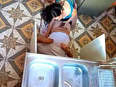 unfaithful wife takes rough sex from plumber in kitchen