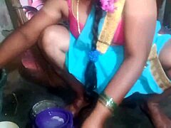 Indian sexy aunty cleans plates while teasing in the dorm
