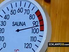german couple relaxes in sauna