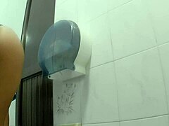 Wow, athletic latina peeing in public bathroom! Big ass alert!