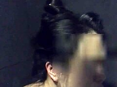 Asian slut wife masturbates with dildo and vibrator in gym shower
