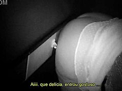 Brazilian housewife in miniskirt invites friend to gloryhole booth for fun.