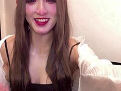 oops, this cute japanese crossdresser with big tits masturbates during live stream in lingerie