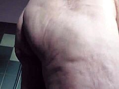Watch this hairy granny slut shove a cucumber deep in her wet pussy!