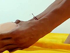 Young man thrusts his massive cock into sexy tattooed sex doll in homemade domination scene