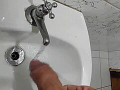 In a surprising display of raw power, the muscular bodybuilder reveals his huge soft cock while urinating outdoors. Curiosity peaks as viewers witness this intimate moment.