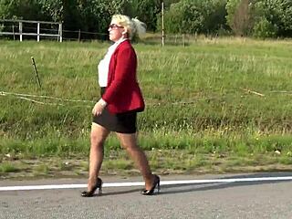 Blonde Secretary In Skirt Hints At Forbidden Desires