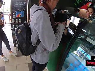 Asian couple’s intense coffee shop thrill