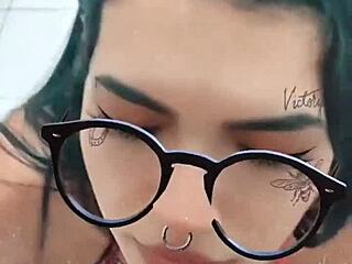 Cum explosion on her tattooed face after blowjob