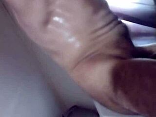 Pole smoker blows hard on webcam feed