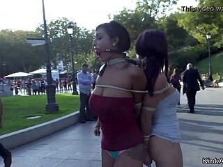 Tied up slaves gagged in public shame