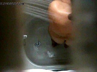 Hidden cam catches steamy shower