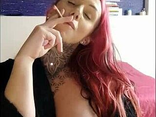 Steamy webcam tease with tattooed babe