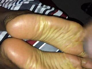 Raw Retro Ebony Footjob in Classic Blue Film