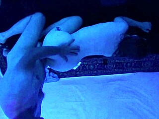 Gigi Breeze Blacklight Massage Under Dim Lights
