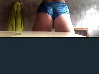 blonde chica films in bathroom