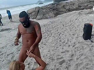 tattooed moreno pounding blonde on beach