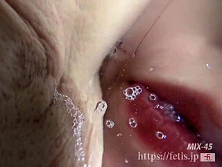 Japanese fetish girls spit and lick with raw intensity